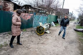 Remains of a shell on one of the streets in the village of Kozarovichi