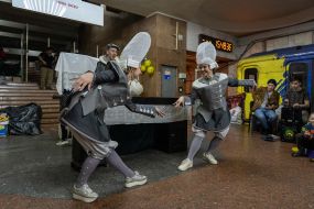Actors of the Kharkiv Academic Puppet Theater play a play for children at one of the metro stations