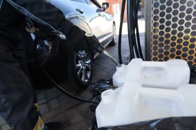 Refueling the car at the gas station in Lviv