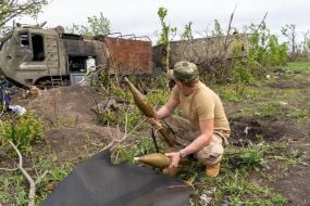 Ukrainian soldier in the former positions of the Russian army