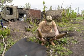Ukrainian soldier in the former positions of the Russian army