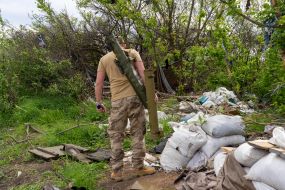 Ukrainian soldier in the former positions of the Russian army