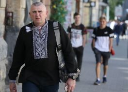 A man in an embroidered shirt on the street in Lviv