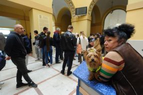 People are standing in line near the Main Post Office of Lviv