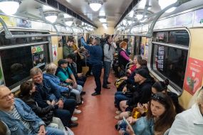 Passengers ride the train in the Kharkiv metro