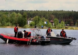 Rescuers are clearing Blue Lake in the village of Gorenka