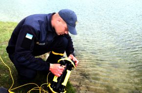 The submarine drone operator configures the submarine drone to search for explosive objects