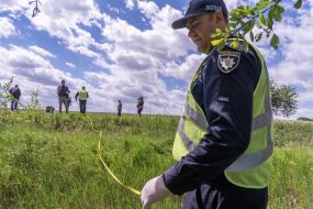 Experts are conducting investigative actions during the exhumation of the body of a murdered resident of the village of Koropove