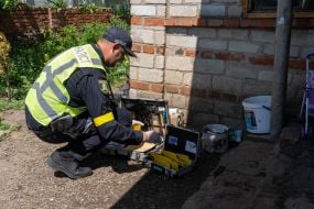 The expert is preparing to exhume the body of the murdered resident of the village of Koropove