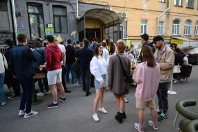 Young people near one of the cafe
