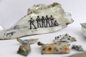 Drawings on the wreckage of downed missiles