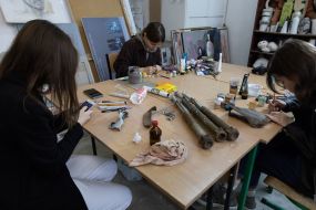 Artists paint fragments of shot down rockets