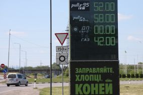 Board with prices near the gas station in the Lviv region