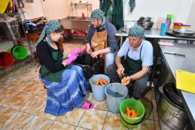 Servants and parishioners of the Zaporozhye Hare Krishna Church prepare food for people according to ancient recipes and technologies