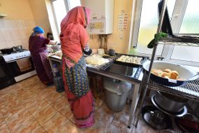 Servants and parishioners of the Zaporozhye Hare Krishna Church prepare food for people according to ancient recipes and technologies