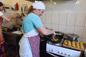 Servants and parishioners of the Zaporozhye Hare Krishna Church prepare food for people according to ancient recipes and technologies