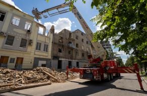 Rescuers dismantle debris in Kharkiv