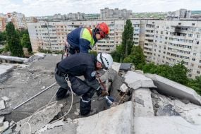 Rescuers dismantle debris in Kharkiv