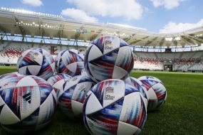 Soccer balls on the stadium field