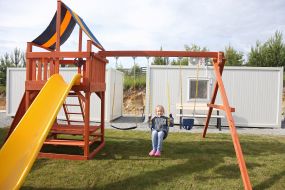 Playground in a modular town for migrants