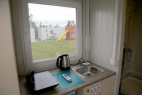 Room in a modular town for migrants Leo States near Lviv
