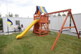 Playground in a modular town for migrants