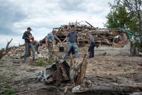 Residents of the village of Kuhari have united and are dismantling the rubble of destroyed homes