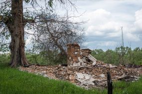 Houses destroyed in the bombing in the village of Kuhari