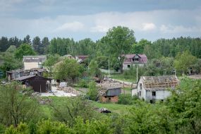 Houses destroyed in the bombing in the village of Kuhari