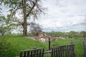 Houses destroyed in the bombing in the village of Kuhari