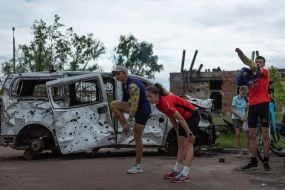Children train on the territory of the destroyed specialized children's and youth sports school of the Olympic reserve