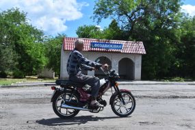 Elderly man on a motorcycle