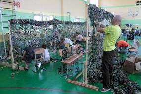 Kyiv volunteers make camouflage nets and suits for the Armed Forces