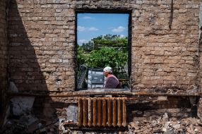 Building damaged by shelling in Moshchun village (Kyiv region)