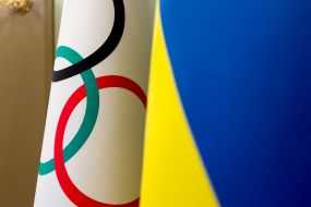 The Olympic flag and the flag of Ukraine