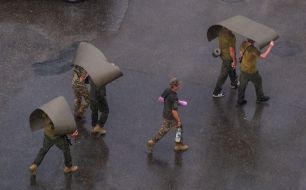 Passers-by during the rain in Kyiv