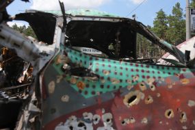 A car destroyed by the Russian occupiers in Irpen