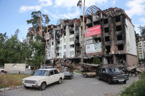 Cars loaded with scrap metal in Irpen