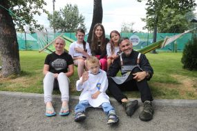 Hector Jimenez-Bravo with residents of "Iron Town" in Irpen