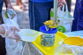 Hare Krishna volunteers distribute free food