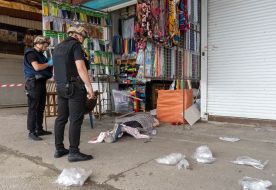 The body of a murdered man at the Barabashovo market in Kharkiv
