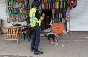 The body of a murdered man at the Barabashovo market in Kharkiv