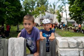 The boys near the House of Culture in the village of Yagidne, Chernihiv region