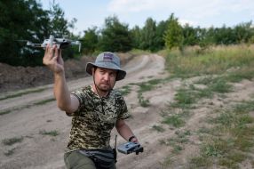 A military man with a drone