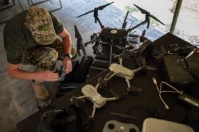 A military man with a drone