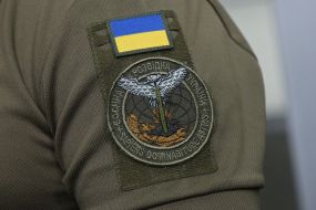 Patch on the uniform of Andrey Yusov, representative of the Main Intelligence Directorate