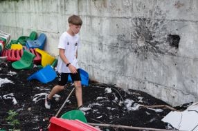 The children train at the stadium, half-destroyed as a result of shelling by the Russian occupiers
