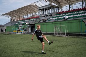 The children train at the stadium, half-destroyed as a result of shelling by the Russian occupiers
