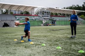The children train at the stadium, half-destroyed as a result of shelling by the Russian occupiers