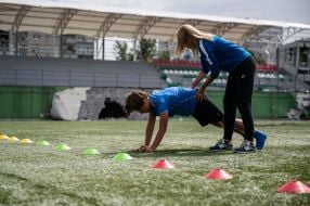 The children train at the stadium, half-destroyed as a result of shelling by the Russian occupiers